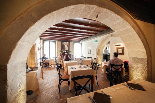 Majoituspaikan Algilà Ortigia Charme Hotel ravintola tai vastaava paikka