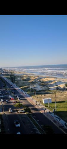an aerial view of a highway with cars on it at Apartamento Beira mar Capão da Canoa in Capão da Canoa