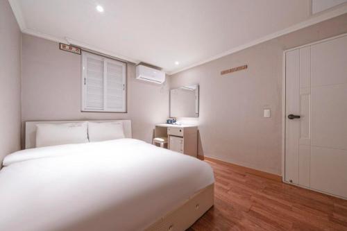 Llit o llits en una habitació de HOTEL mini