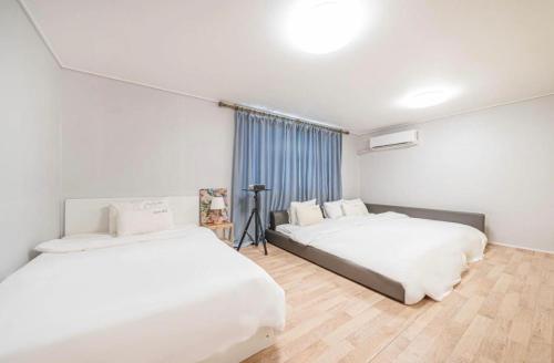 Postel nebo postele na pokoji v ubytování HOTEL mini