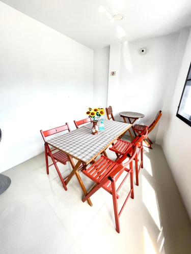 a dining room with a table and chairs at Inn Trog And Inn Soi in Bangkok