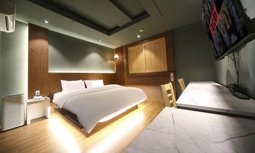 Krevet ili kreveti u jedinici u okviru objekta Hotel Feel Green