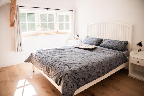 Posteľ alebo postele v izbe v ubytovaní Wohnung ELVIS in der Ferienscheune Alte Ölmühle