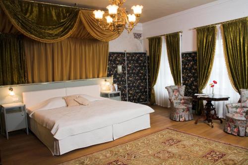 Cama o camas de una habitación en Antonius Hotel