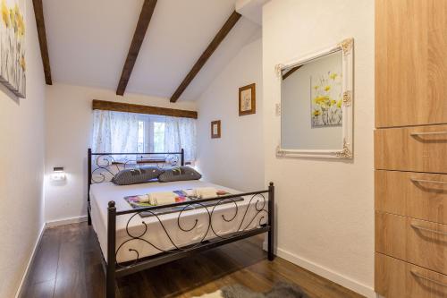Postel nebo postele na pokoji v ubytování Villa MARTA