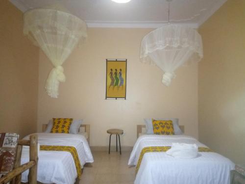 Una cama o camas en una habitación de Lycklama Guesthouse