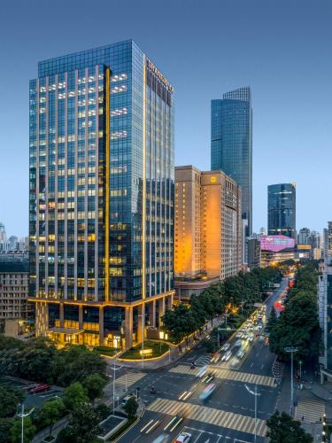 a city skyline with tall buildings and a street at Shangri-La Wuhan,Close to The Mixc with three subway lines in Wuhan