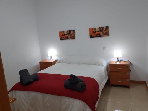 Кровать или кровати в номере Talavera Apartament