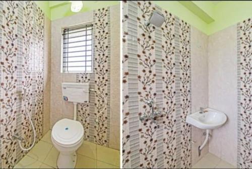 łazienka z toaletą i umywalką w obiekcie Goroomgo Green Oasis Inn Kolkata w mieście Pānchuria