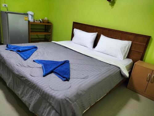 Postel nebo postele na pokoji v ubytování Lanta Blue House