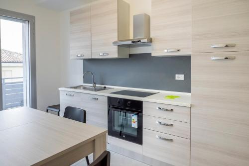 Kuchyň nebo kuchyňský kout v ubytování SE029 - Mondolfo, nuovo trilocale con balcone ed a/c