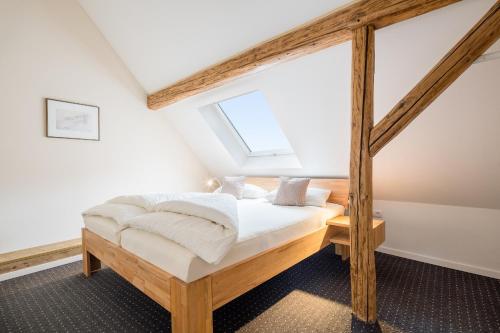 Säng eller sängar i ett rum på Landhotel Löwen