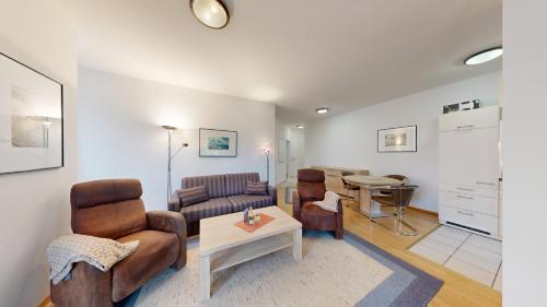 Χώρος καθιστικού στο Villa Strandblick in Binz, FeWos direkt am Strand mit Balkon und teilweise mit Meerblick