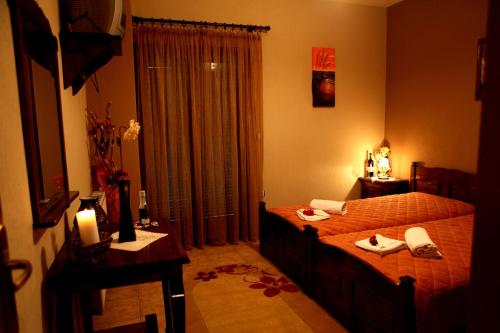 Ένα ή περισσότερα κρεβάτια σε δωμάτιο στο Dione Apartments