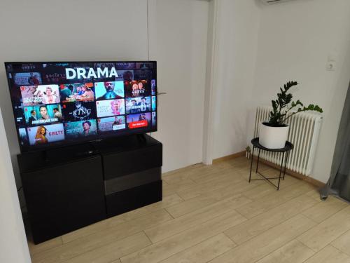 TV i/ili multimedijalni sistem u objektu S & K Apartment free indoor parking