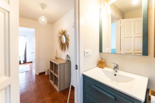 a bathroom with a sink and a mirror at Romaní del Montgrí in L'Estartit