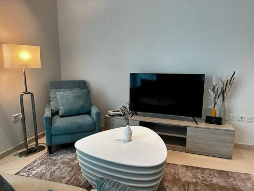 TV a/nebo společenská místnost v ubytování Luxurious 1 bedroom at Palm Jumeirah