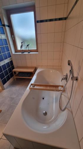 Ένα μπάνιο στο Ferienwohnung Stützenmühle