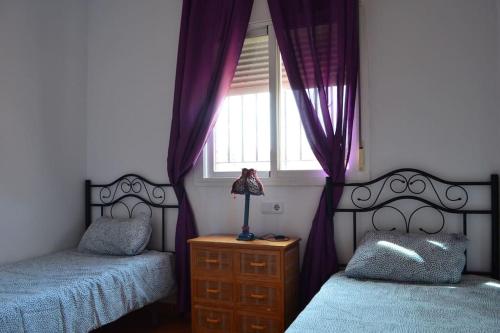 Ein Bett oder Betten in einem Zimmer der Unterkunft isla mayor resort