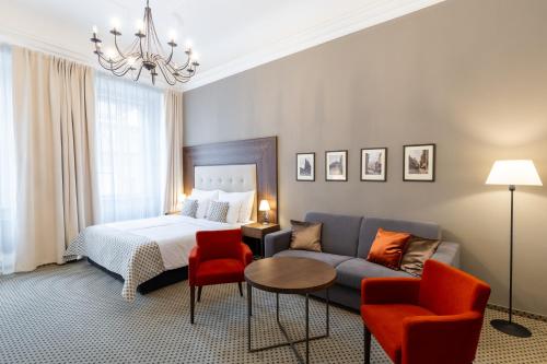 Postel nebo postele na pokoji v ubytování Hotel Ikona