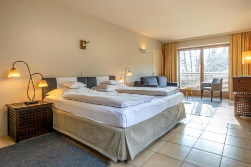 Postel nebo postele na pokoji v ubytování Hotel Edelweiss