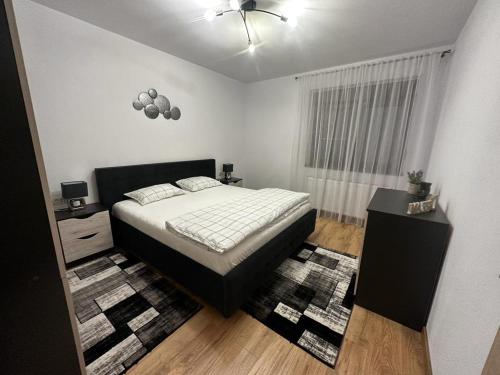 Voodi või voodid majutusasutuse Emanuela Apartaments toas