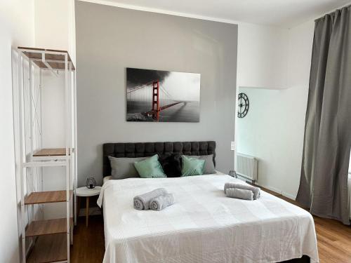 Llit o llits en una habitació de Gemütliche Wohnung mit Garten