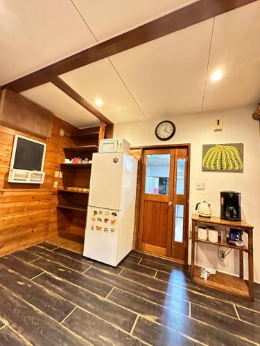 Moment Chalet Hakubaにあるキッチンまたは簡易キッチン
