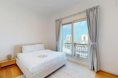 Postel nebo postele na pokoji v ubytování Marina Residence 1 - Locations