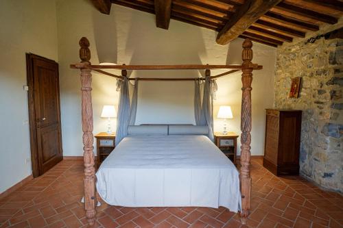 Giường trong phòng chung tại Tenuta La Veduta