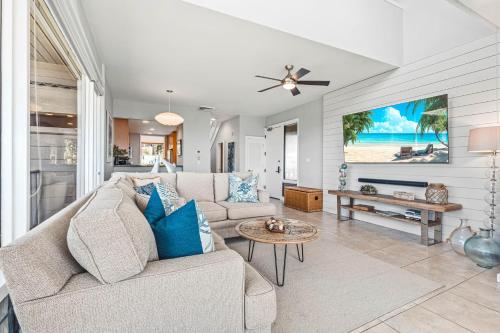 a living room with a couch and a table at Kapalua Bay Villa 32B3 in Honokahua