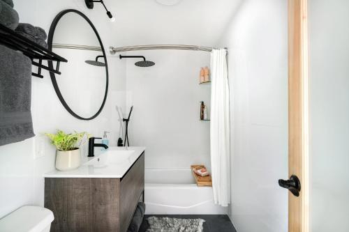 a bathroom with a shower and a sink and a toilet at 3 BR 1 Bath Prime Williamsburg in Brooklyn