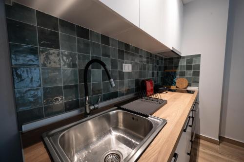 Η κουζίνα ή μικρή κουζίνα στο Central Studio SKG