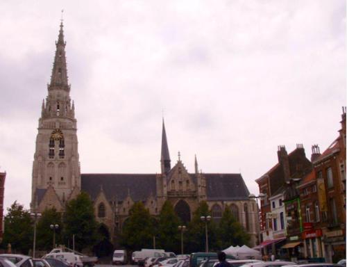 a church with two towers and a clock tower at One bedroom appartement with wifi at Anderlecht in Brussels
