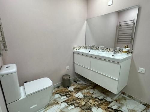 Un baño de Hotel complex house near the beach