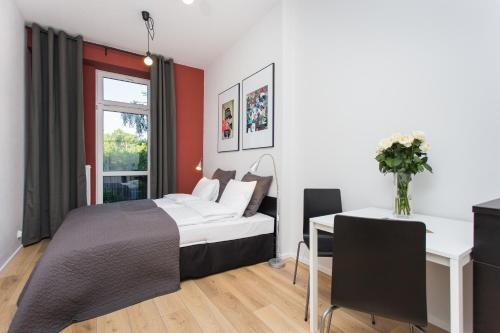 Кровать или кровати в номере Krakow B&B