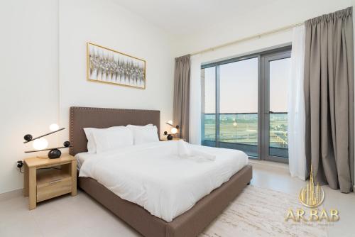 Postel nebo postele na pokoji v ubytování Arbab Homes Premium 1BR-Canal View-Near Dubai Mall
