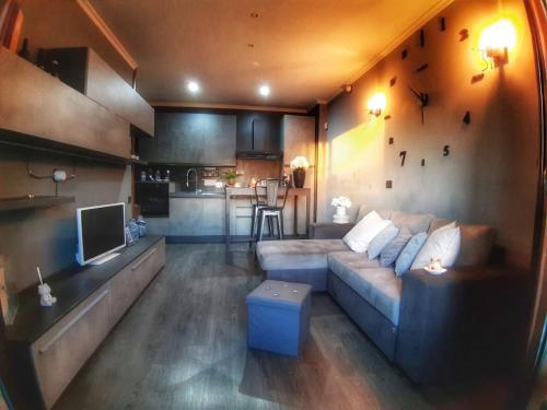 Khu vực ghế ngồi tại Come a Casa Tua Luxury Apartment Centre