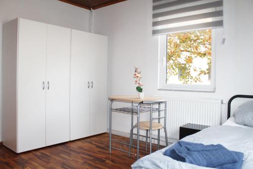 Ένα ή περισσότερα κρεβάτια σε δωμάτιο στο Fully equipped Apartments