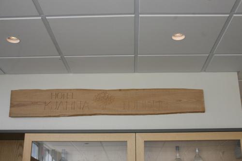 a ceiling with a sign that says hotel khalifa at Hotel Kjarnalundur- Aurora Dream - Lodges and Rooms in Akureyri