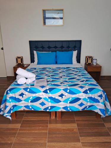Ένα ή περισσότερα κρεβάτια σε δωμάτιο στο Las Fragatas Casa Hotel