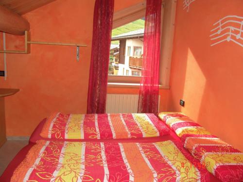 Giường trong phòng chung tại Casa Martina