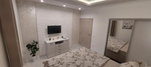 GOLD APARTMANIにあるベッド