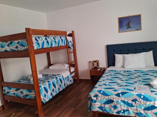 Ένα ή περισσότερα κρεβάτια σε δωμάτιο στο Las Fragatas Casa Hotel