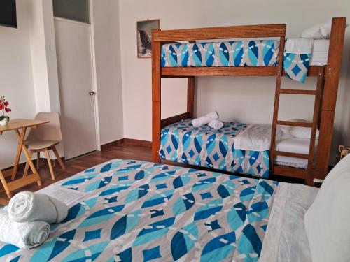 Ένα ή περισσότερα κρεβάτια σε δωμάτιο στο Las Fragatas Casa Hotel