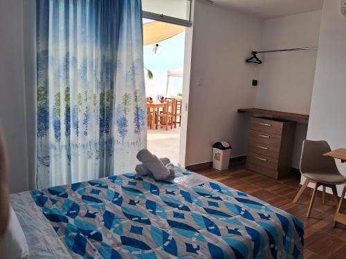 Ένα ή περισσότερα κρεβάτια σε δωμάτιο στο Las Fragatas Casa Hotel