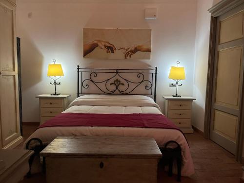 Krevet ili kreveti u jedinici u okviru objekta Le Arcate del Giglio - Luxury Suite