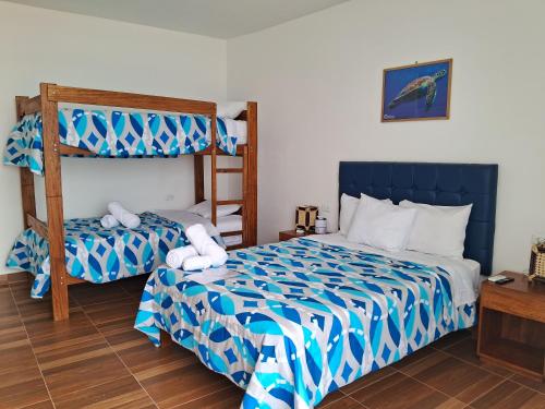 Ένα ή περισσότερα κρεβάτια σε δωμάτιο στο Las Fragatas Casa Hotel