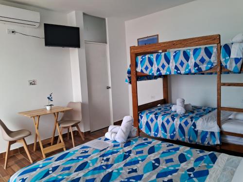 Ένα ή περισσότερα κρεβάτια σε δωμάτιο στο Las Fragatas Casa Hotel