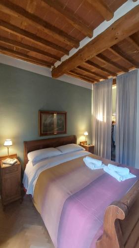 Ліжко або ліжка в номері Residenza San Giorgio